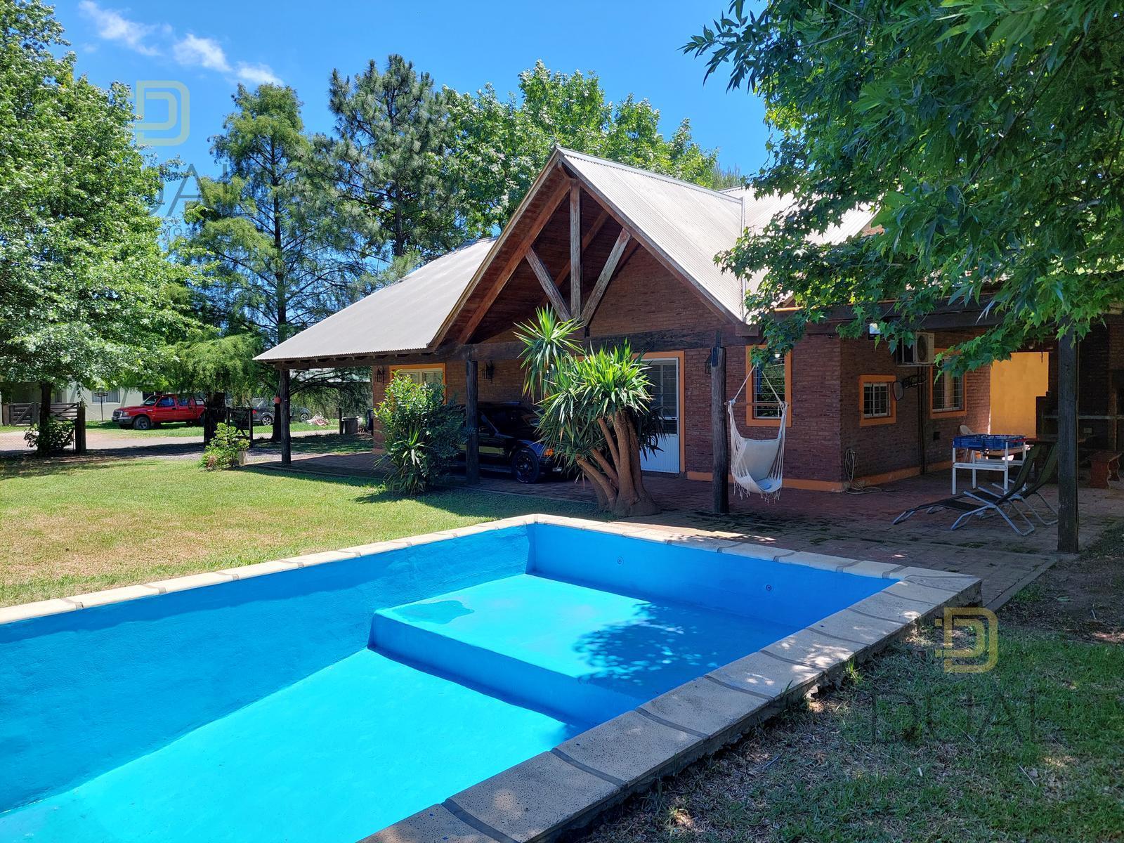 VENTA CASA 3 DORMITORIOS Y PILETA EN COUNTRY LOGARITMO (IBARLUCEA) — foto 1